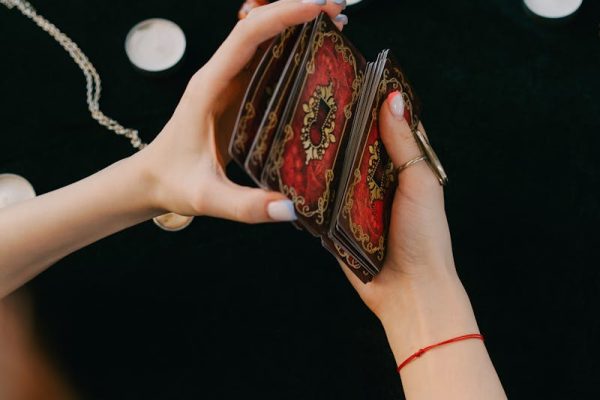 Collection of tarot cards and guidebooks for beginners