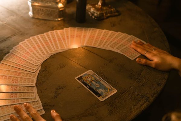 Multiple tarot decks displayed showing different card designs for beginners