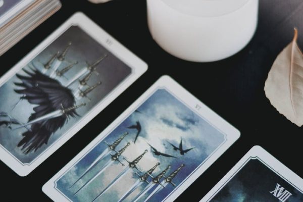 Tarot cards arranged in a spread pattern for divination reading
