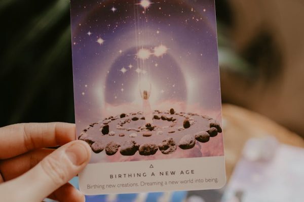 Tarot cards with candles and crystals in a mystical beginner setup